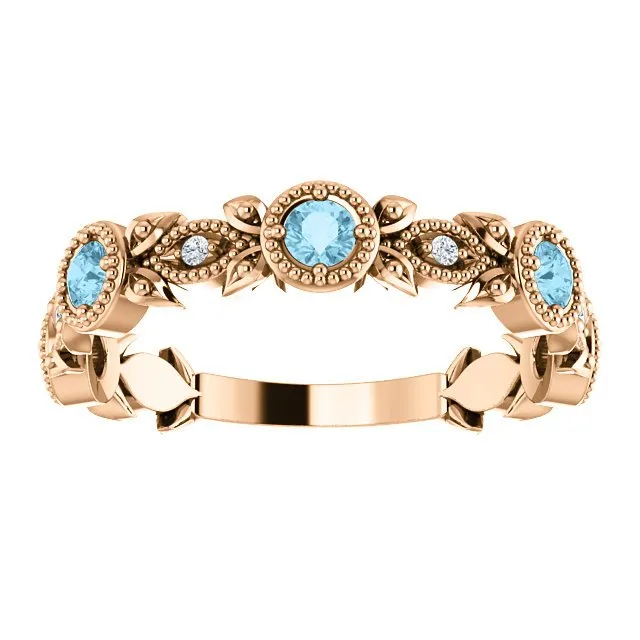 14KT GOLD 0.30 CTW AQUAMARINE & 0.03 CTW DIAMOND LEAF RING