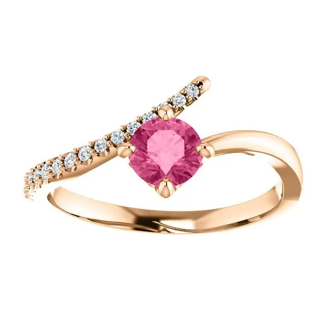 14KT GOLD 0.55 CT PINK TOURMALINE & 1/10 CTW DIAMOND BYPASS RING